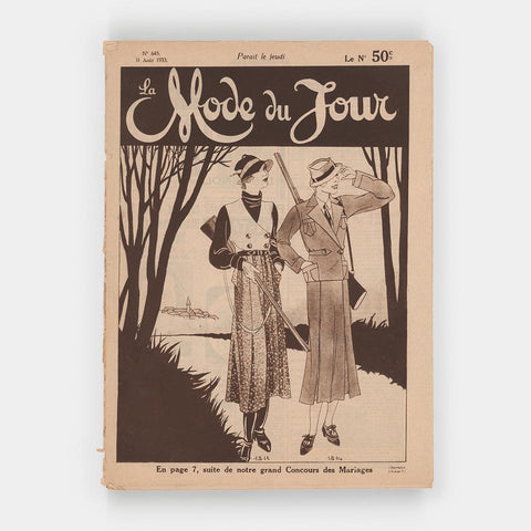 [3 magazines with scripts on the masthead]