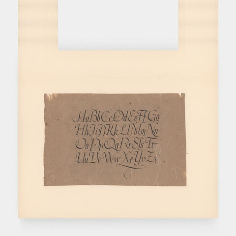 [an alphabet on brown paper]