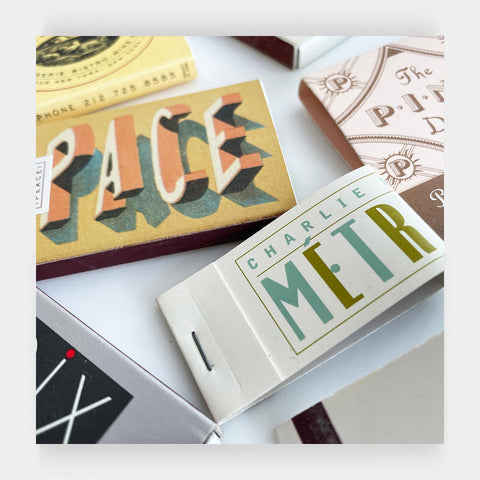 [8 matchboxes and matchbooks designed by Louise Fili]