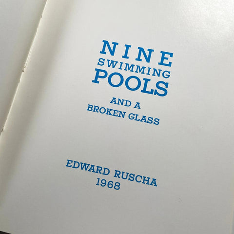 Nine Swimming Pools and a Broken Glass