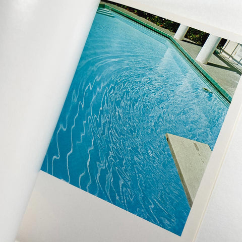Nine Swimming Pools and a Broken Glass
