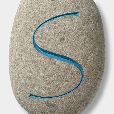 [a cap S cut by Philip Surey]